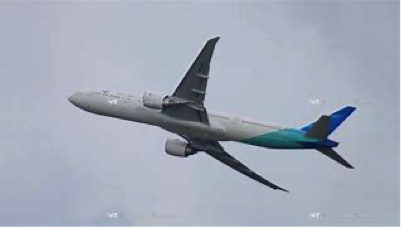 Airplane taking off in sky