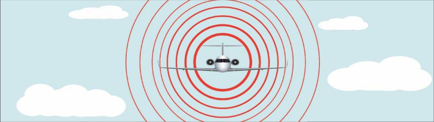 Screenshot 2025-10-23 at 2.24.11 PM Illustration of an airplane flying toward the viewer, with red concentric circles surrounding it to represent radiating sound waves. The background includes a blue sky with scattered white clouds.